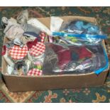 A box containing craft items, fabrics, buttons etc.