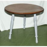 A three legged side table