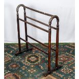 A mahogany towel rail