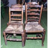 Four ladder back chairs