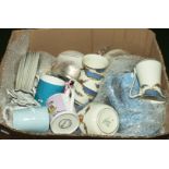 A box of pottery and china tea ware