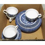 A box containing assorted Willow pattern table ware