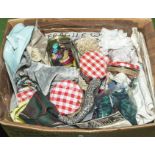 A box containing craft items, fabrics, buttons etc.