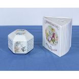 A Royal Albert Peter Rabbit money box together with a Wedgwood money box