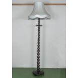 A bobbin standard lamp and shade