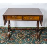 A reproduction mahogany side table