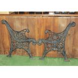 A pair of cast iron bench ends