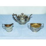 A silver three piece tea service marks for Birmingham various years