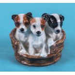 Doulton puppies in a basket