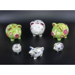 Six piggy money banks