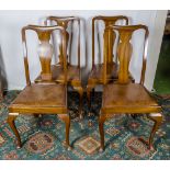 A set of four dining chairs