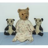 A vintage plush Teddy bear and two felt pandas