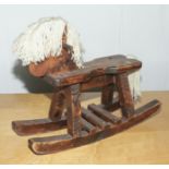 A child’s wooden rocking horse