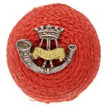 Canada. Princess Patricias Light Infantry Officer red cord boss bearing silver and gilt badge. Badge