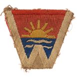 102nd Coast Artillery Brigade printed formation sign. Khaki cloth embroidered with white letter W