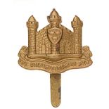 Cambridgeshire Regiment WW1 brass economy cap badge circa 1916-18. Good scarce die-stamped Castle of