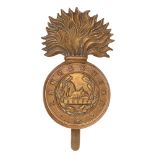 Lancashire Fusiliers pagri badge circa 1881-1914. Good die-stamped brass flaming grenade, the ball