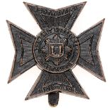 6th Bn. East Surrey Regiment cap badge circa 1908-20. Good die-stamped blackened brass Maltese cross