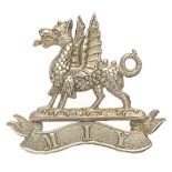 Welsh. Montgomeryshire Imperial Yeomanry cap badge circa 1901-08. Good scarce die-stamped white