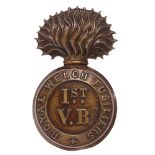 1st (Wrexham) VB Royal Welch Fusiliers cap badge circa 1896-1908. Good scarce die-stamped bronzed