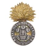 Royal Welch Fusiliers Officer cap badge. Fine scarce die-cast gilt flaming grenade, the ball mounted