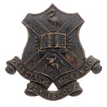 Herne Bay College OTC, Kent cap badge circa 1908-40. Good scarce die-stamped blackened brass College