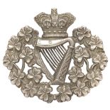 Royal Irish Regiment Victorian Foreign Service helmet badge circa 1881-1901. Good rare die-stamped