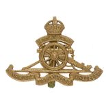 Singapore Volunteer Artillery cap badge circa 1915-22. Good scarce British made die-stamped brass