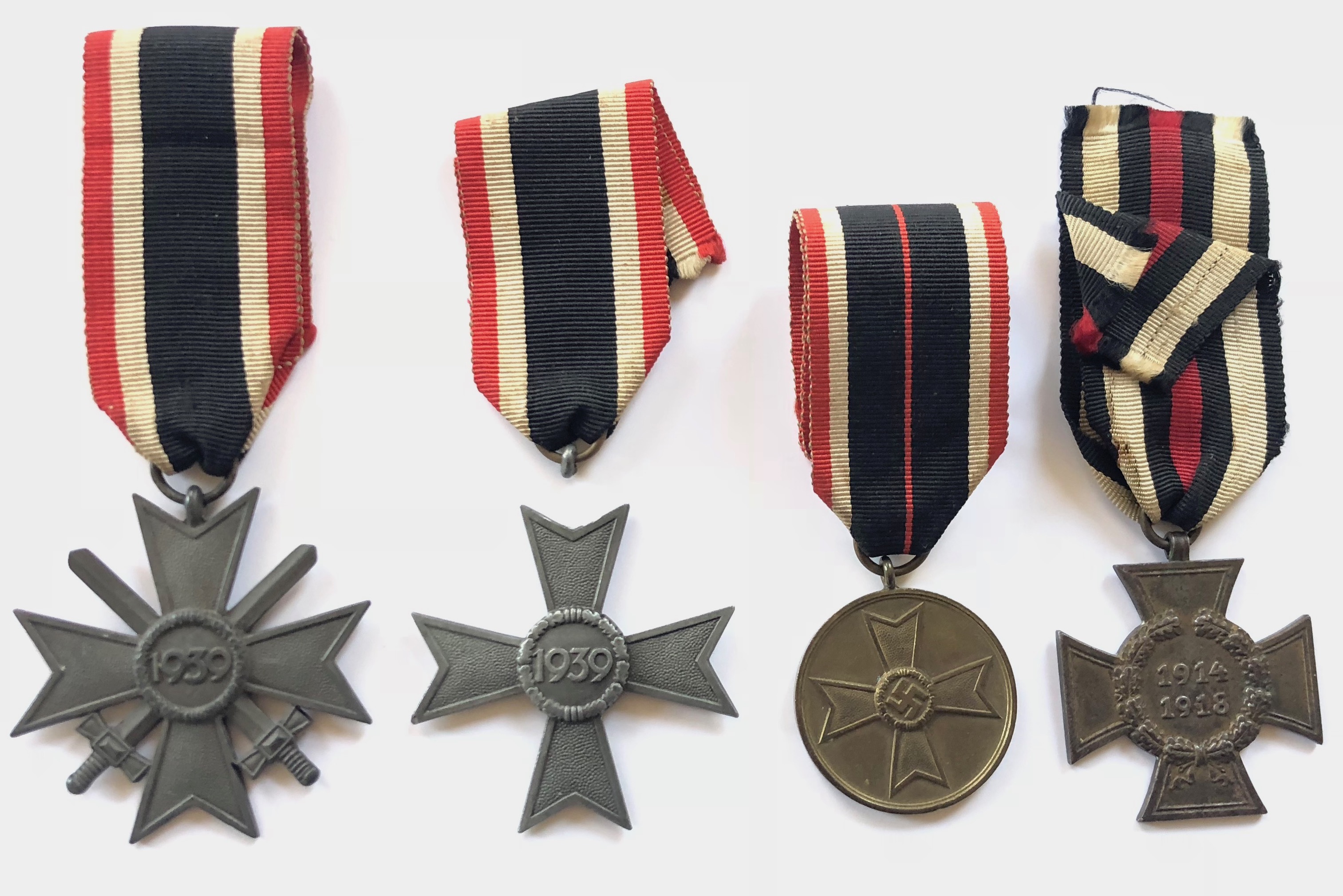 German Third Reich 4 assorted medals. 1939 War Merit Cross, 2nd Class with swords ... 1939 War Merit