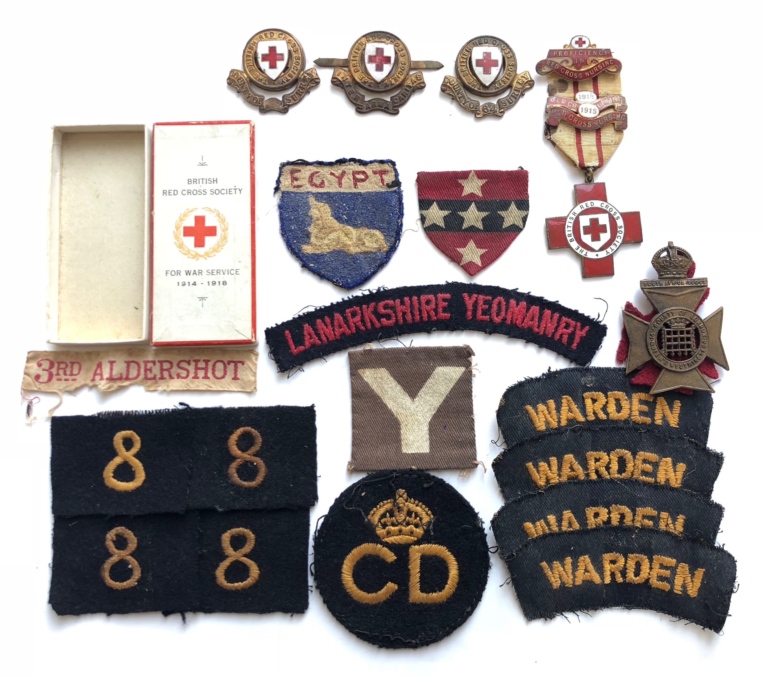 20 badges inc. WW2 Civil Defence, Red Cross & Lanarkshire Yeomanry cloth shoulder title. Comprising: