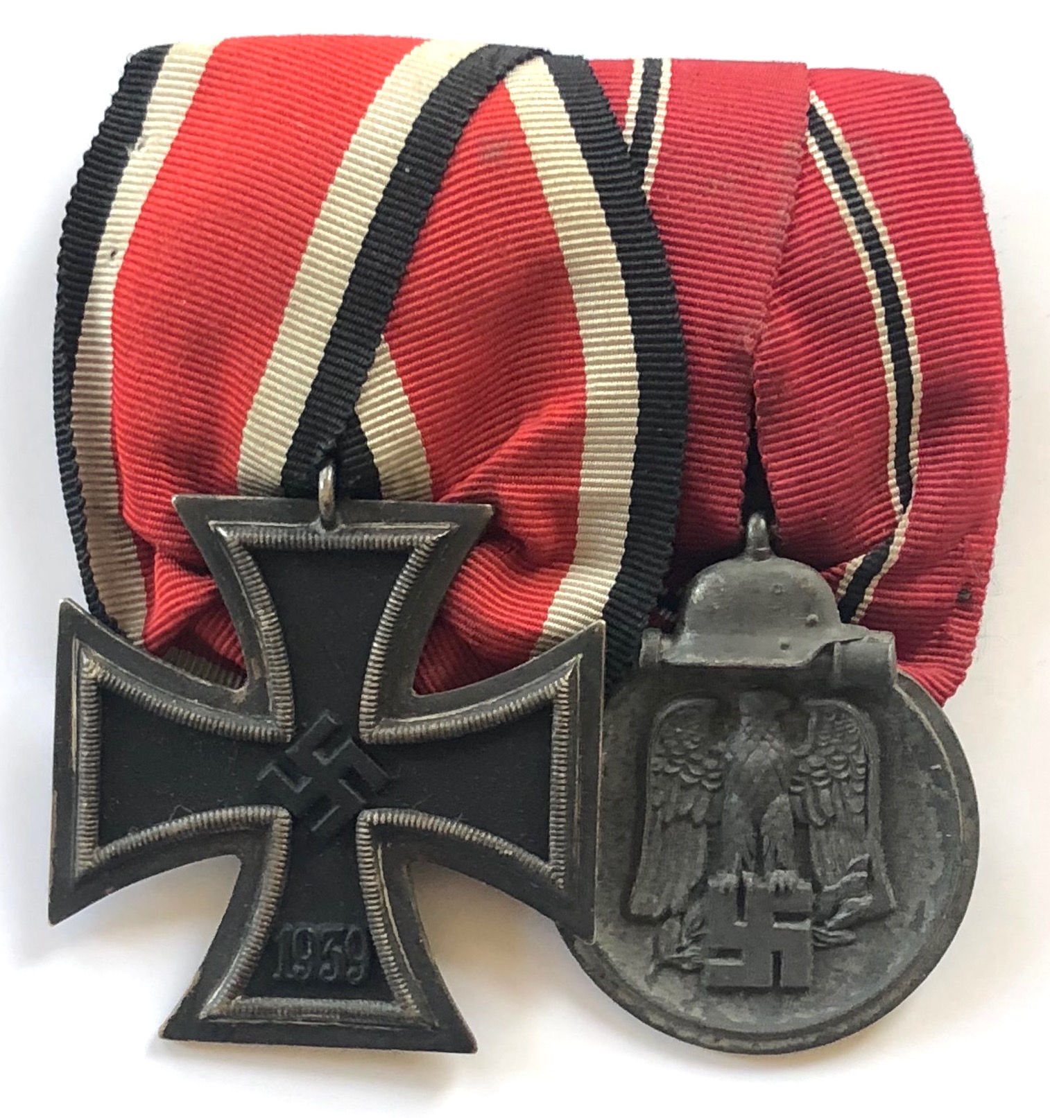 German Third Reich Iron Cross and Eastern Front pair of medals. Good 1939 Iron Cross 2nd Class