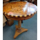 A 19th century and later mixed wood low occasional table with a marquetry top Location: RAM