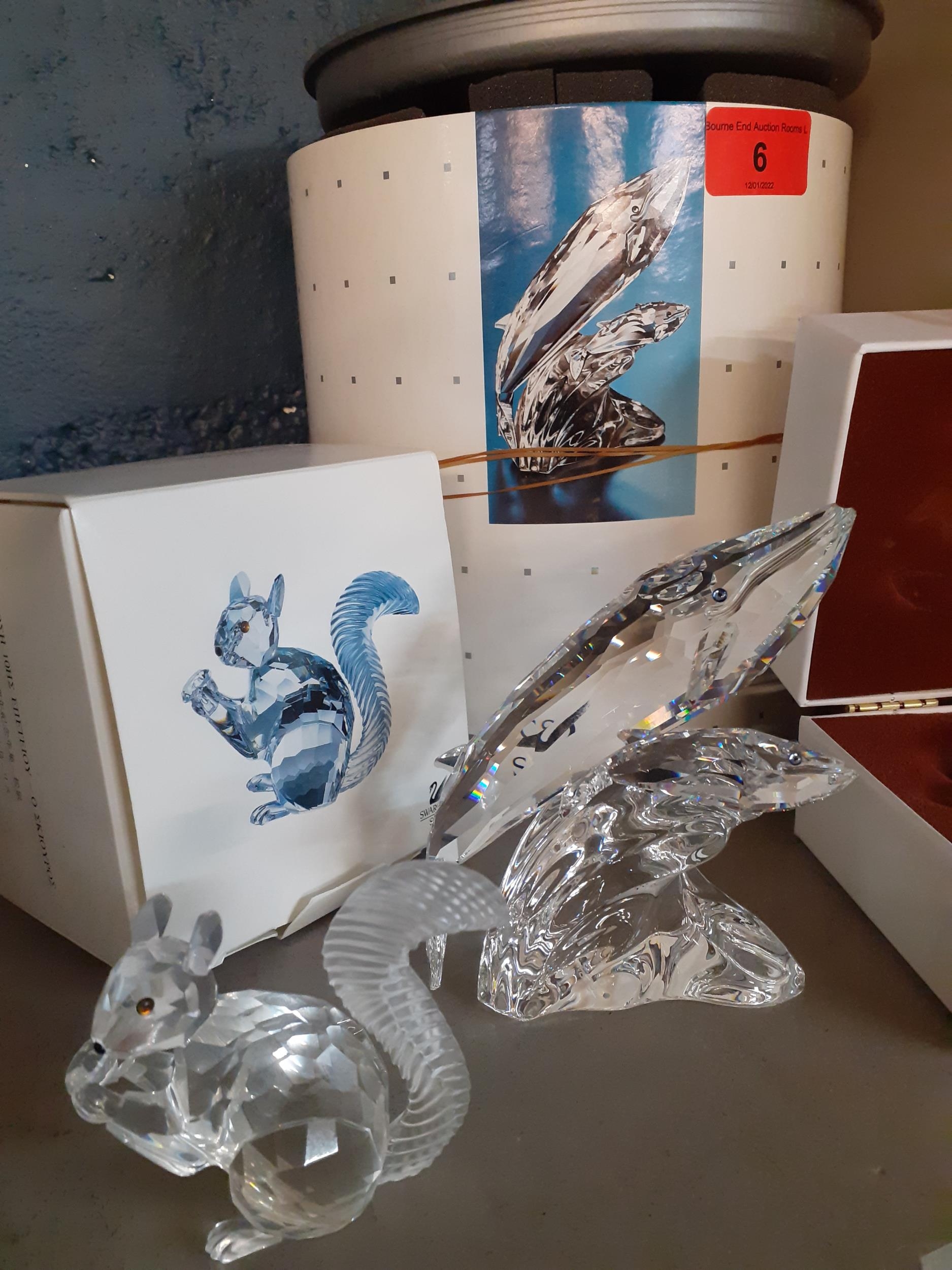 Swarovski SCS collectables - a crystal model of a whale and her cub on an integral mount together