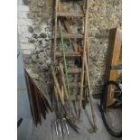 A selection of vintage garden tools, together with a step ladder, tools, and other items Location: