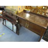 An early 20th century mahogany two door side cupboard, together with an overmantle wall mirror