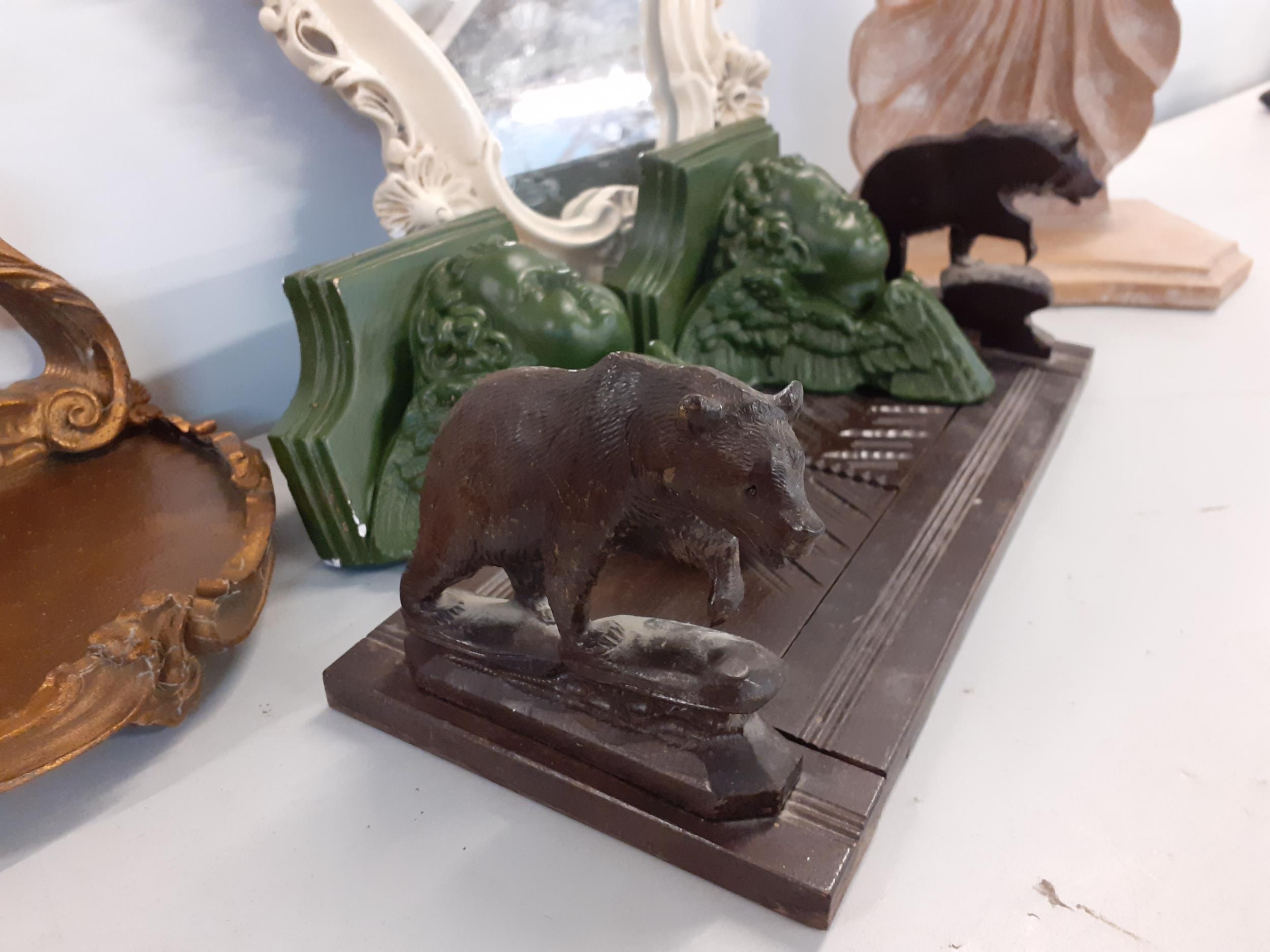 A Black Forest carved book rest with mounted bears to each end, a mid 20th century painted wall - Image 2 of 2