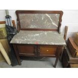 An early 20th century mahogany and marble topped wash stand 117cm h x 95cm w