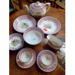 A 19th Century part tea set having a white ground with pink banding and flora Location: SL