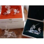 Swarovski SCS collectables - a crystal model of a unicorn, a model of a seated Kudo and a model of a