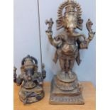 Two decorative metallic models of Ganesh, 30cm and 62cm respectively Location: RWB