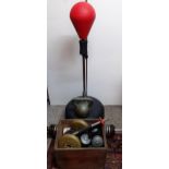 Gym equipment to include a boxing punch ball and metal weights Location: G