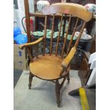 A 19th century beech and elm spindle back armchair Location: