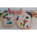 A late 20th century Brio wooden train set with bridge, trains and accessories Location: LWB