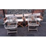 Four fabric and wooden folding director style chairs together with a pair of teak folding garden