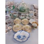 Early 20th century bone china to include four T. Goode & Co coffee cans and saucers having a cream