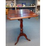 A square formed mahogany occasional tilt topped table on tripod support together with a vintage