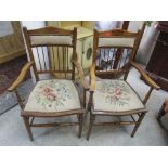 A pair of Edwardian walnut tapestry seated armchairs Location: