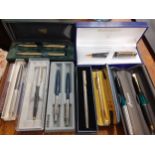 A collection of pens and pencils to include Parker ball points, yard-o-led, a Parker Frontier set, a