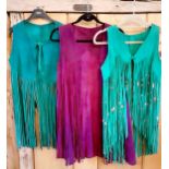 Three Retro Spanish coloured leather ladies waistcoats with long fringe tassels, 2 in racing green (