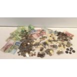 Mixed coinage and banknotes from around the world to include Germany, USA, Denmark, Czech Republic